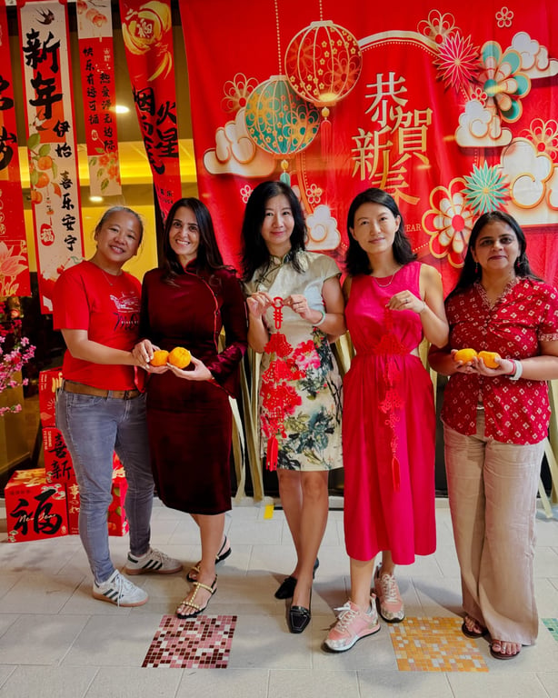Parent volunteers from the school's 'Booster Club' organises Lunar New Year celebrations.