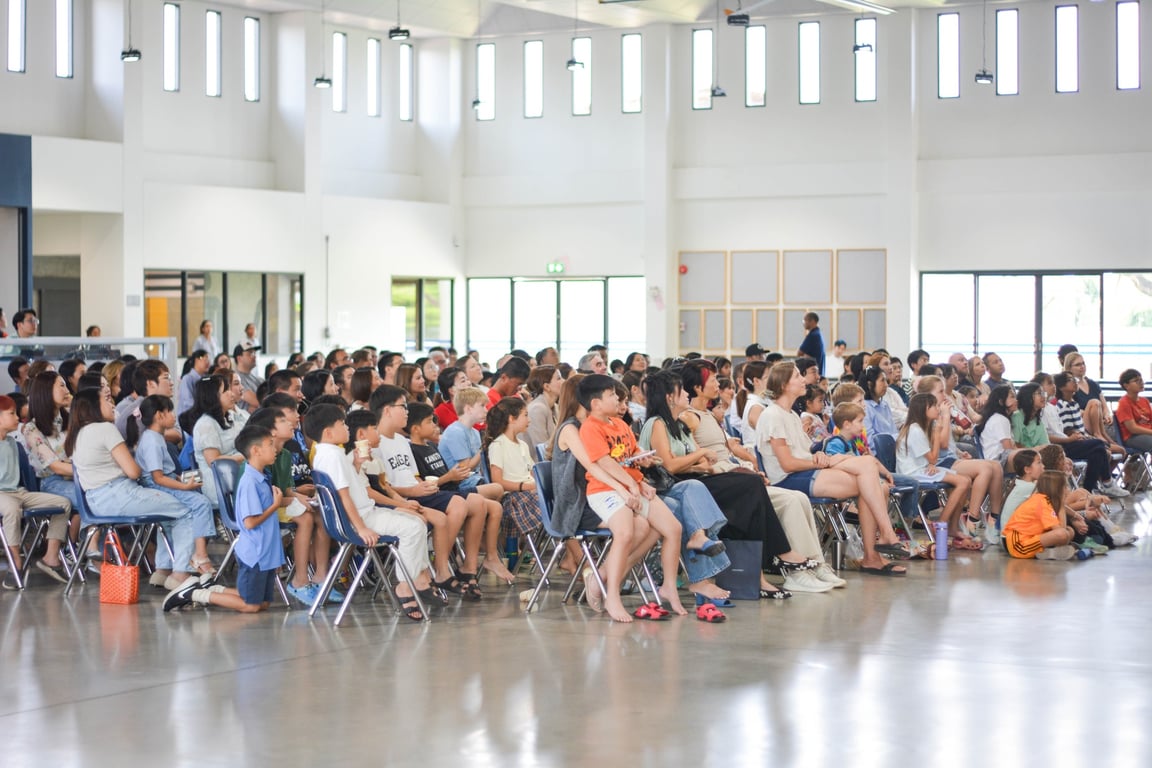 Parents and their kids during the elementary Parent-Teacher orientation,.