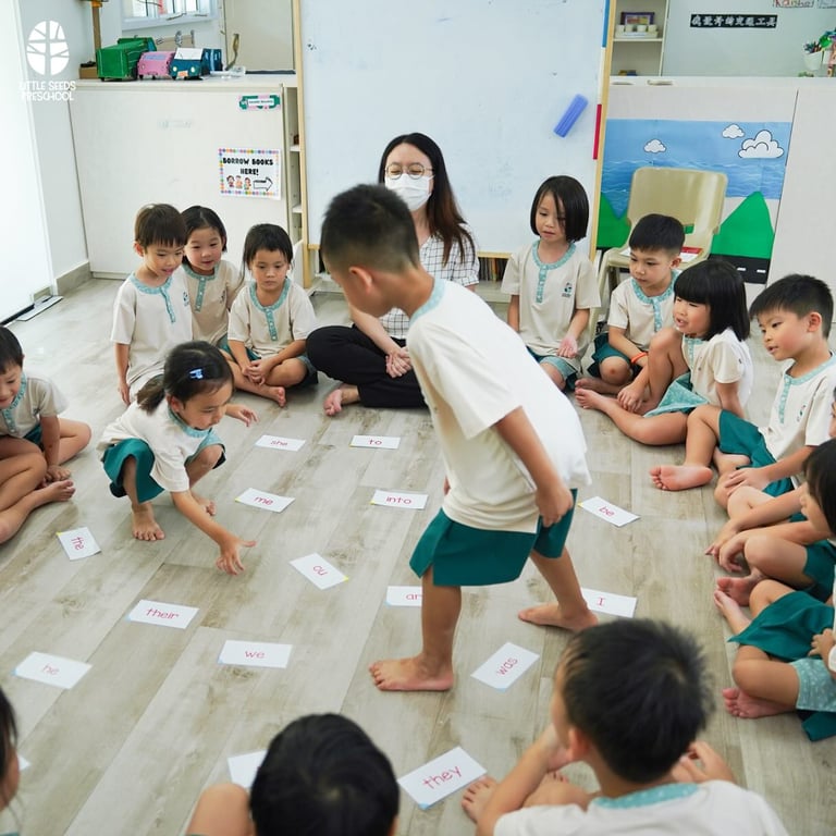 The children taking part in a fun phonics game to aid learning