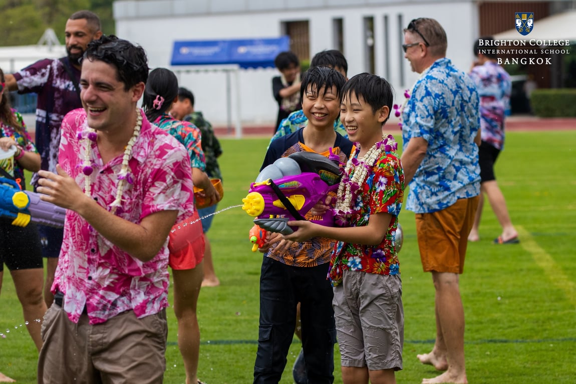 Teachers and pupils celebrating Songkran together with water games.