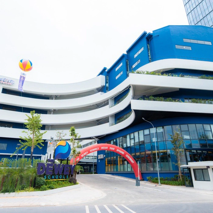 The Dewey Schools Ocean Park campus with curved architectural design.