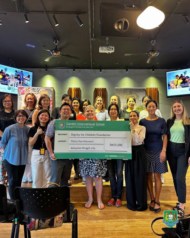 The GIS community celebrate their fundraising efforts at the Spring ball, raising money for two NGOs: Pads & Paws KL and Dignity for Children Foundation.