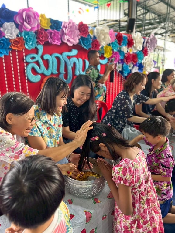 The school community celebrating Songkran festival.