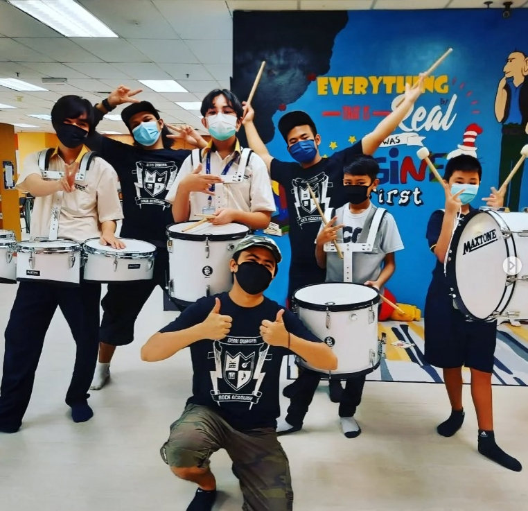 Marching to the beat with energy and teamwork.