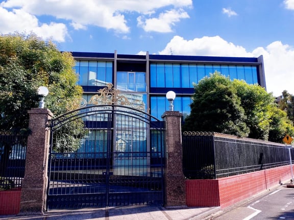 The formal entrance and gate of NUCB International Junior and Senior High School.
