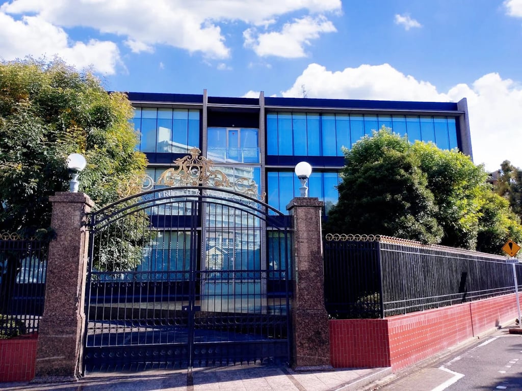 The formal entrance and gate of NUCB International Junior and Senior High School.