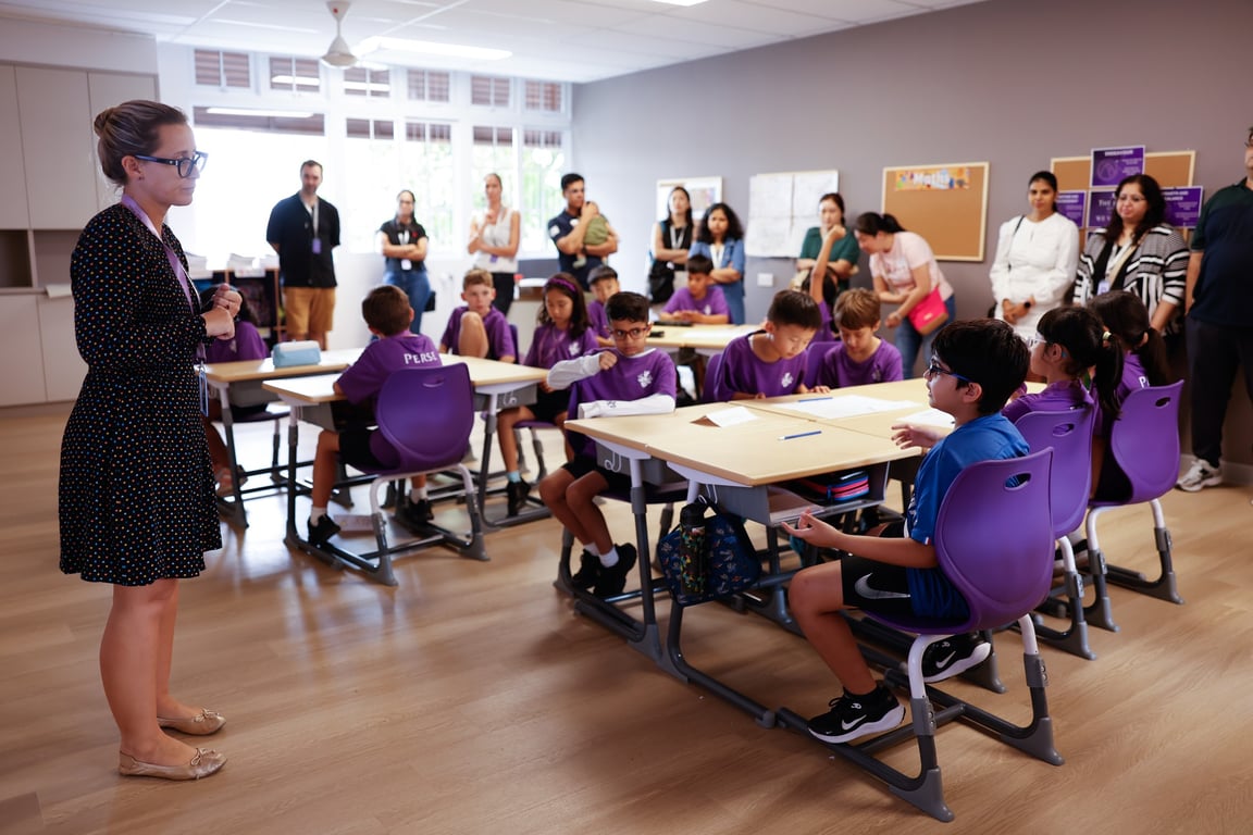 Parents attend an Open Classroom to get firsthand experience on the school's teaching approach.