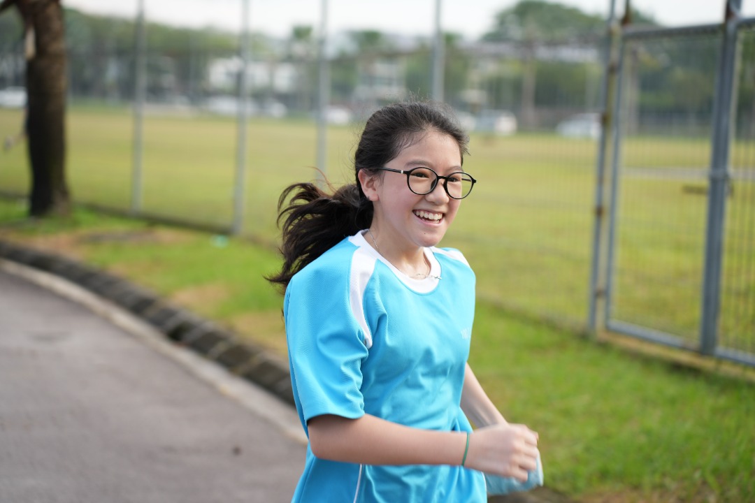 A student keeping active with morning jogs on the school field.