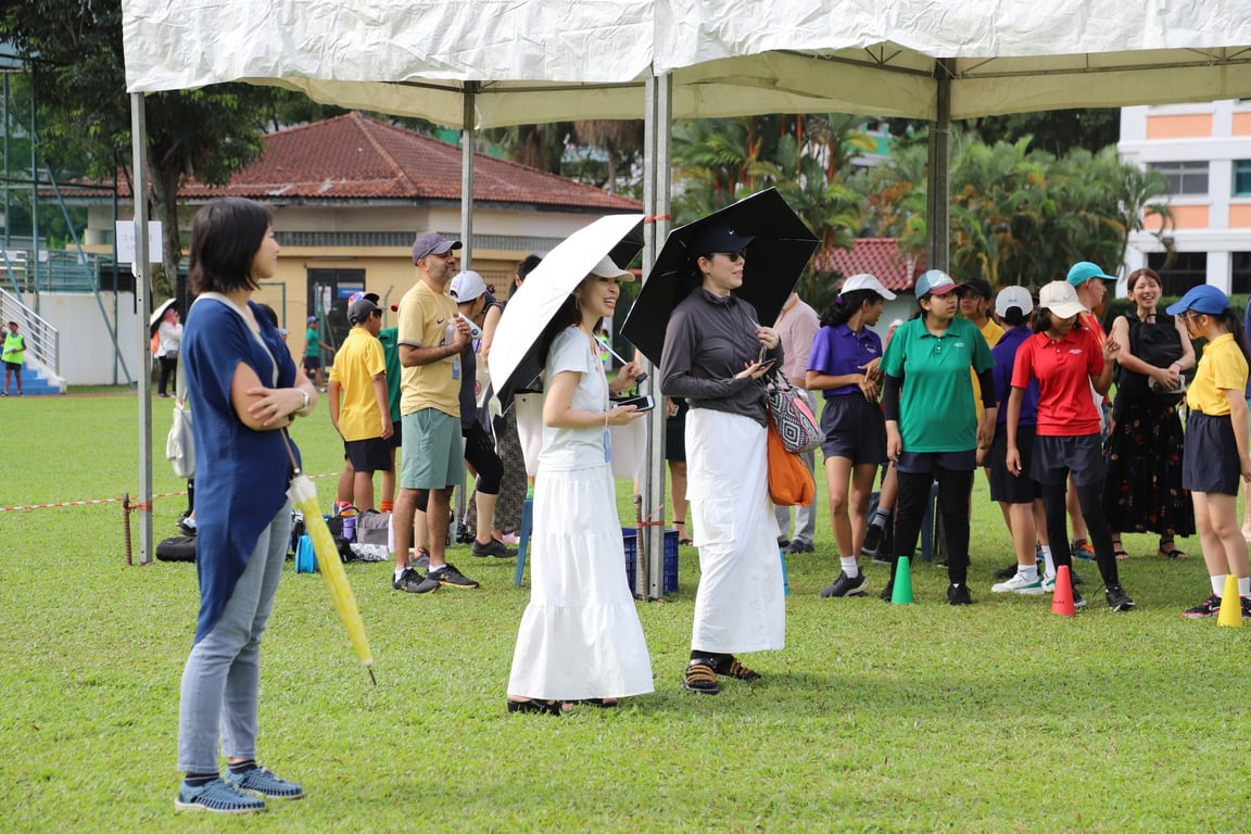 Parents and students watch on during the Sports Day events held on campus