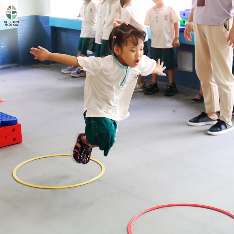 A student working on their motor skills development in a fun filled lesson full of educational exercises