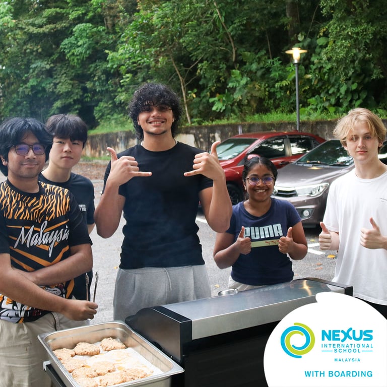Boarding students enjoy an outdoor BBQ dinner on campus