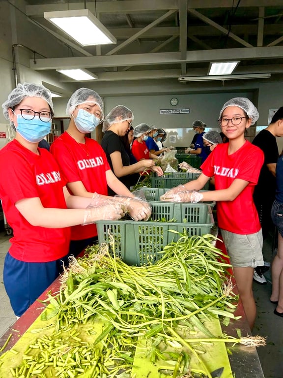 Students volunteering at Willing Hearts, a local soup kitchen.