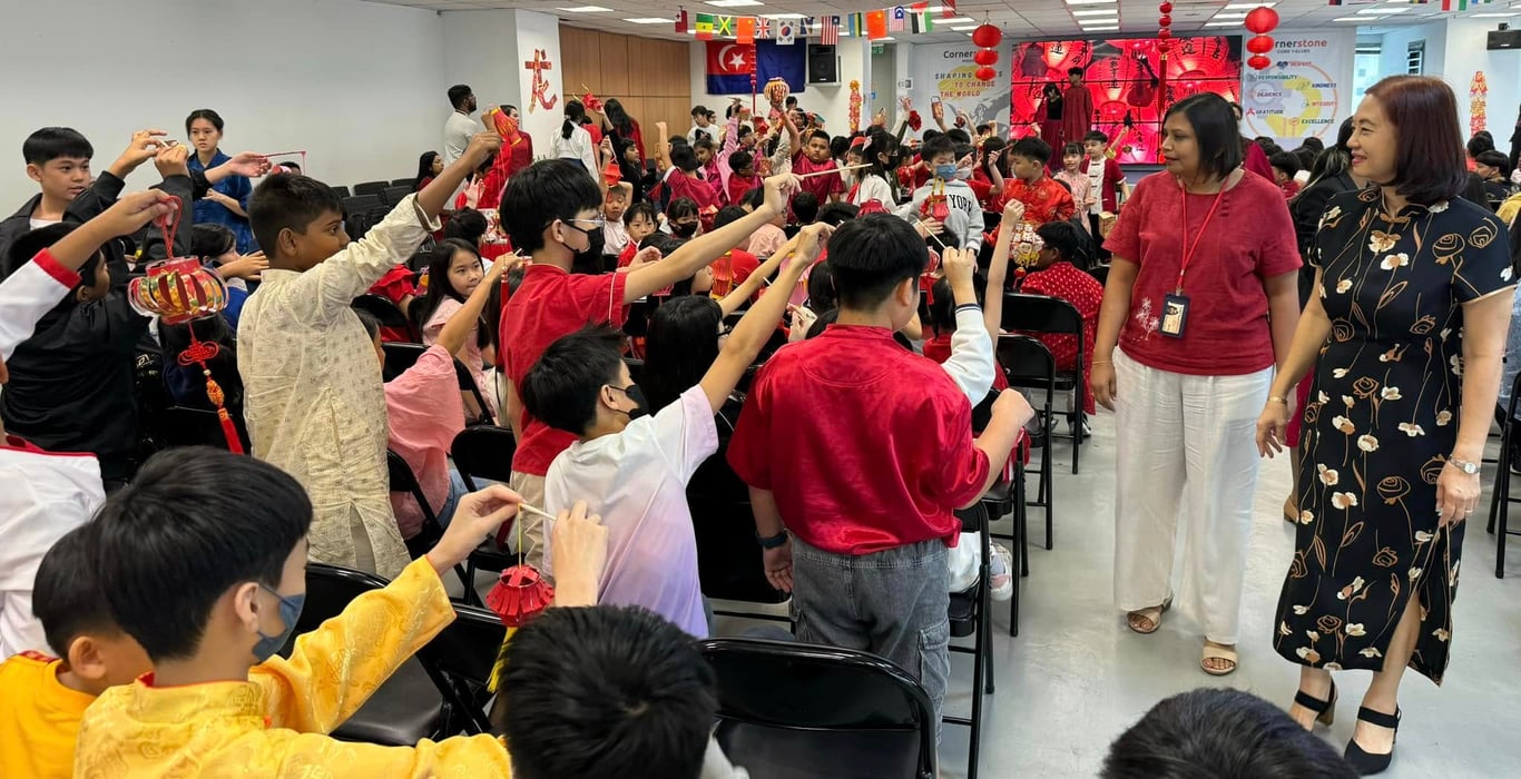 Lanterns held high in celebration during a Chinese cultural event