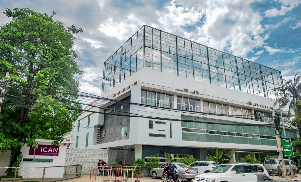A view of the iCAN British International School main building and entrance gate.