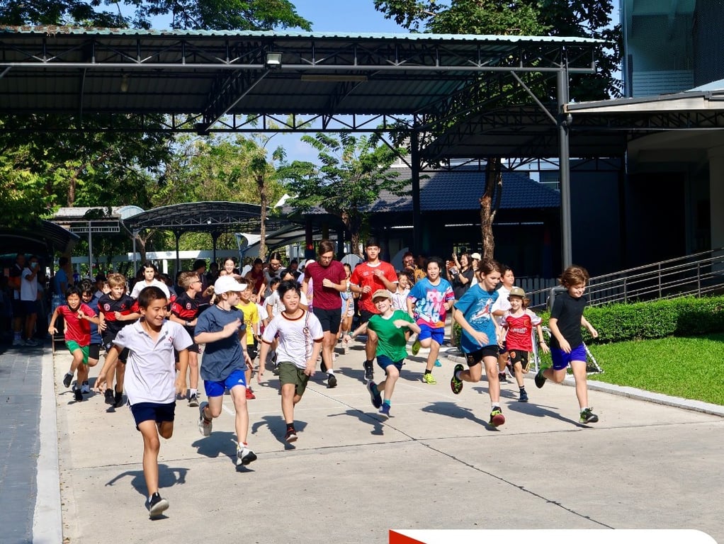 Primary and secondary students participating in the annual charity run.