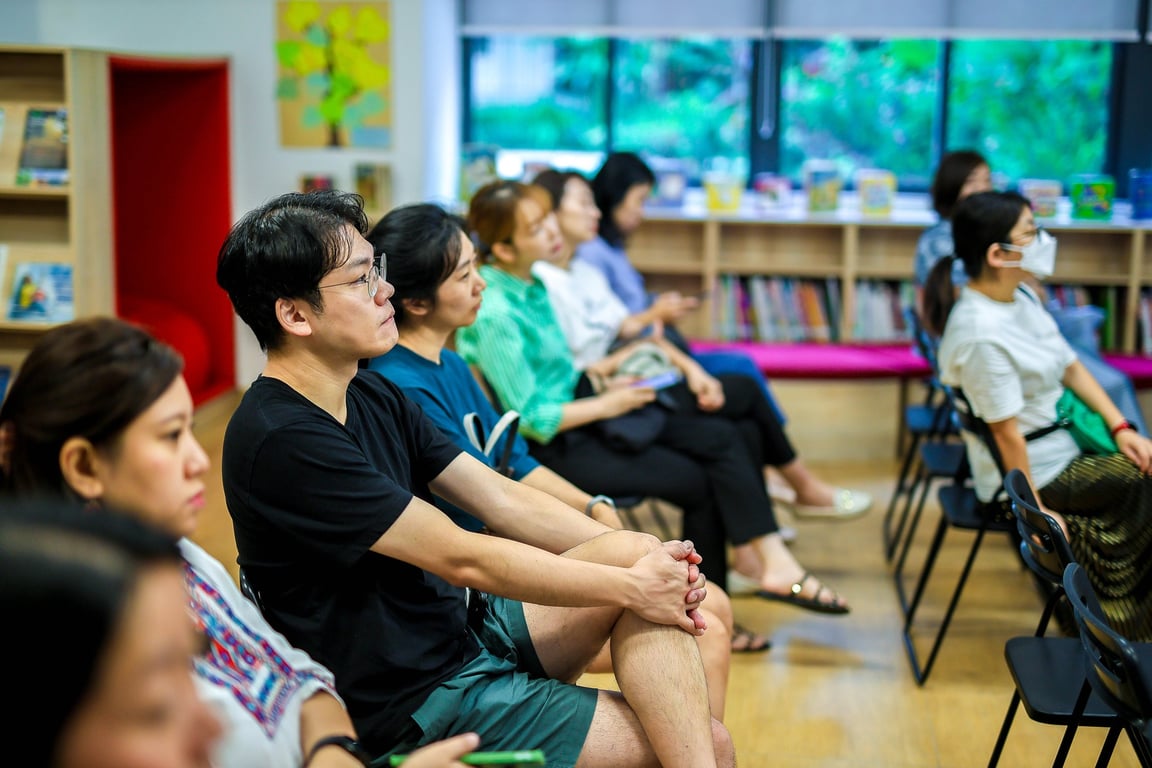 Parents attending MAP test result day to support their child's academic journey.