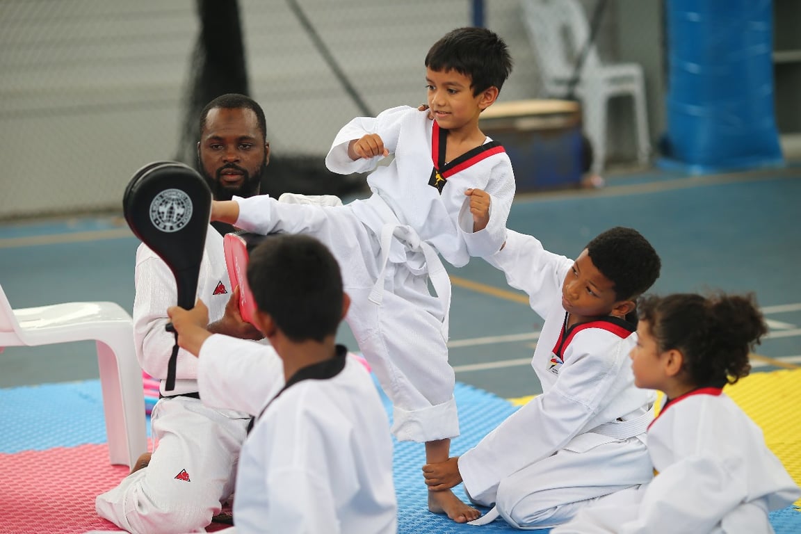 CIS students getting ready for weekend Taekwondo training sessions.