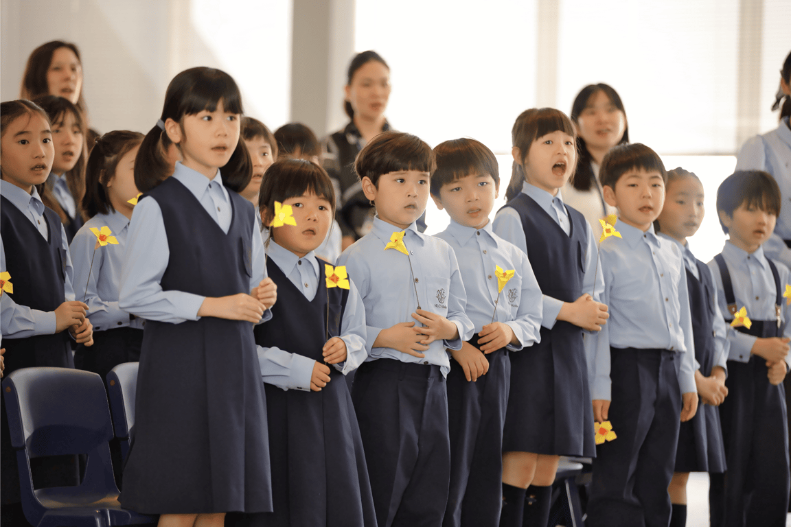 Students singing during Founder's Day