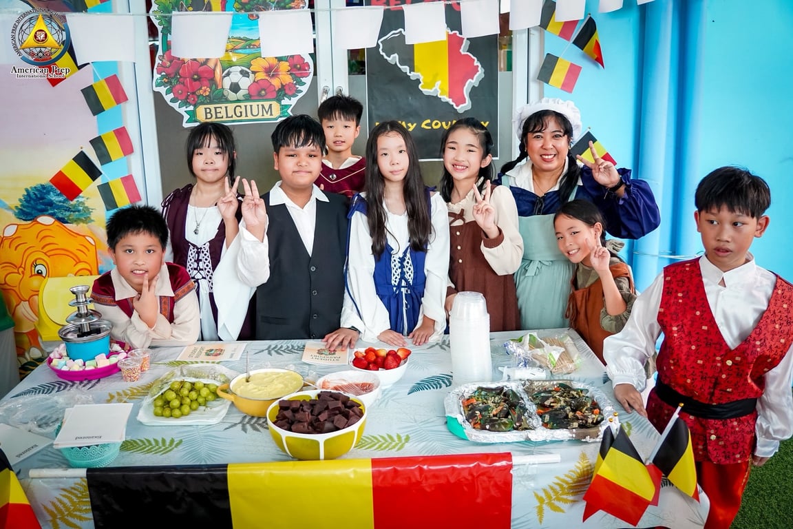 Students dressed in Belgian attire for International Day celebration.