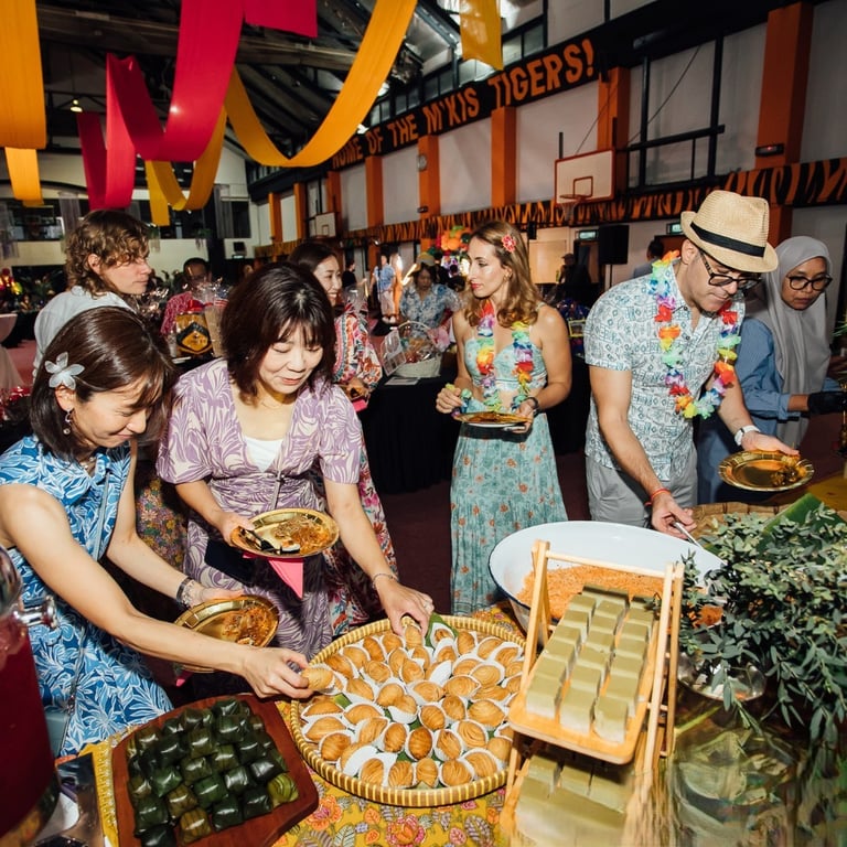 Parents and staff gathered for Mari Makan 2025, an evening filled with vibrant tropical décor, international cuisine, and lively performances.