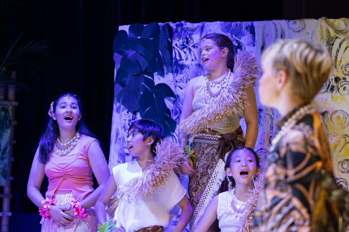 Prep pupils singing during their stage performance.