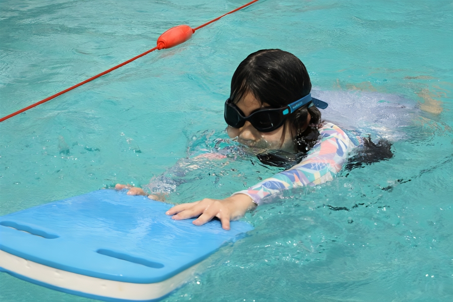 Astra's Early Year student learning swimming skills.