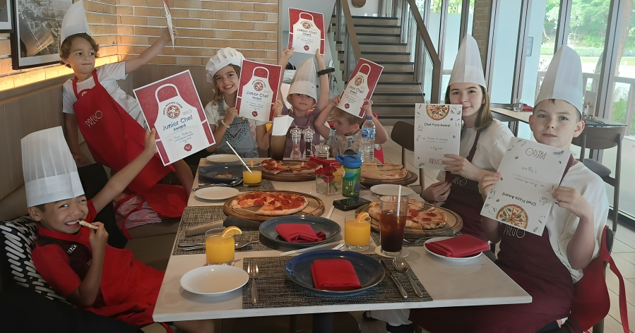 Summer School participants earning Junior Chef certificates.