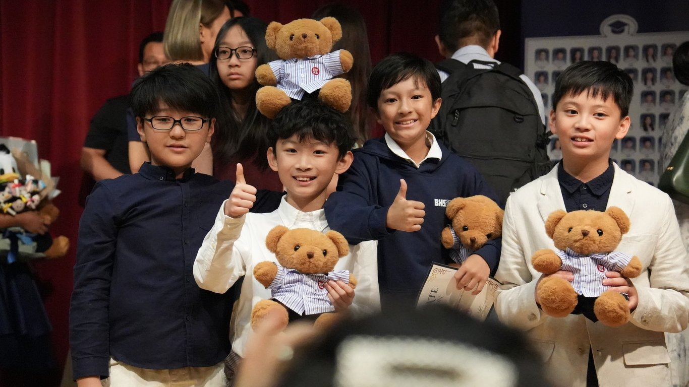 Year 6 students celebrating their primary school graduation ceremony.