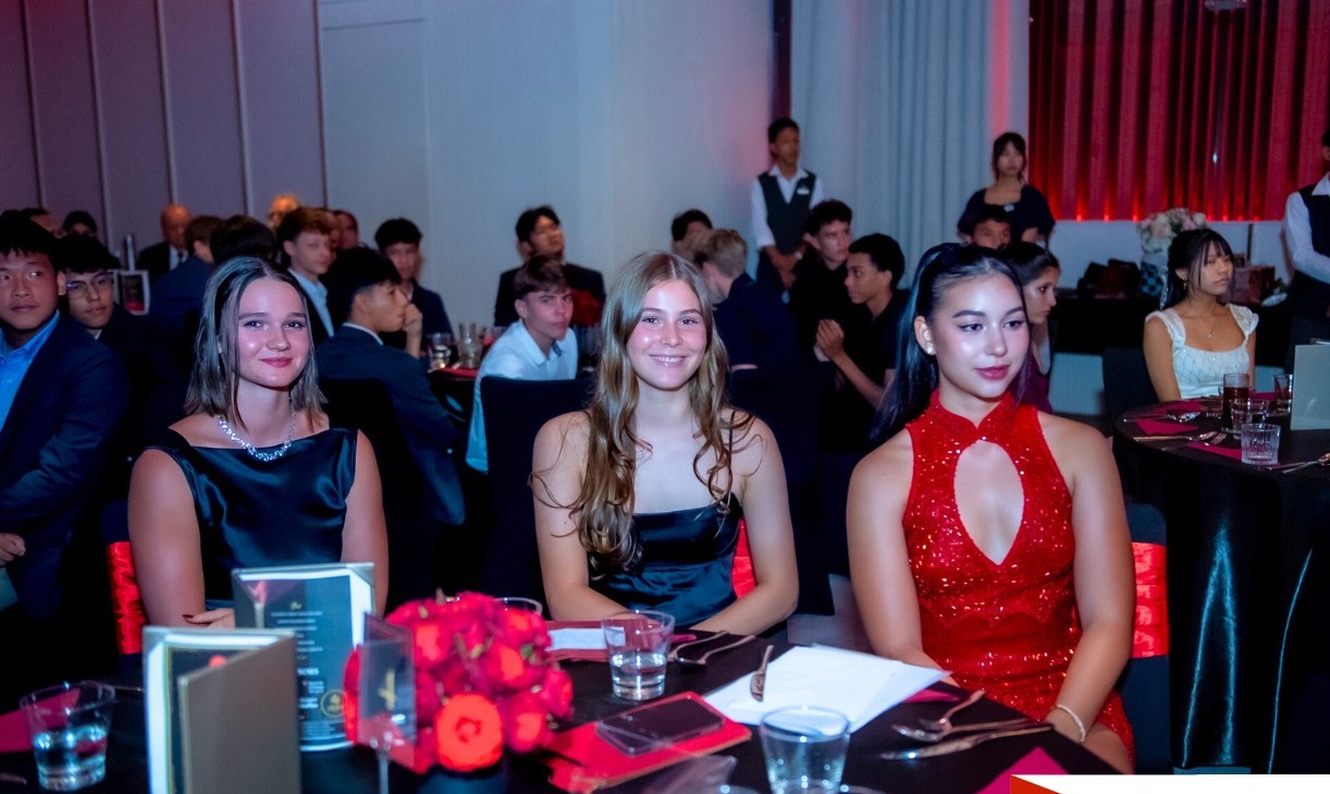 Graduating students celebrating together at the RIS Swiss Section Matura Ball.