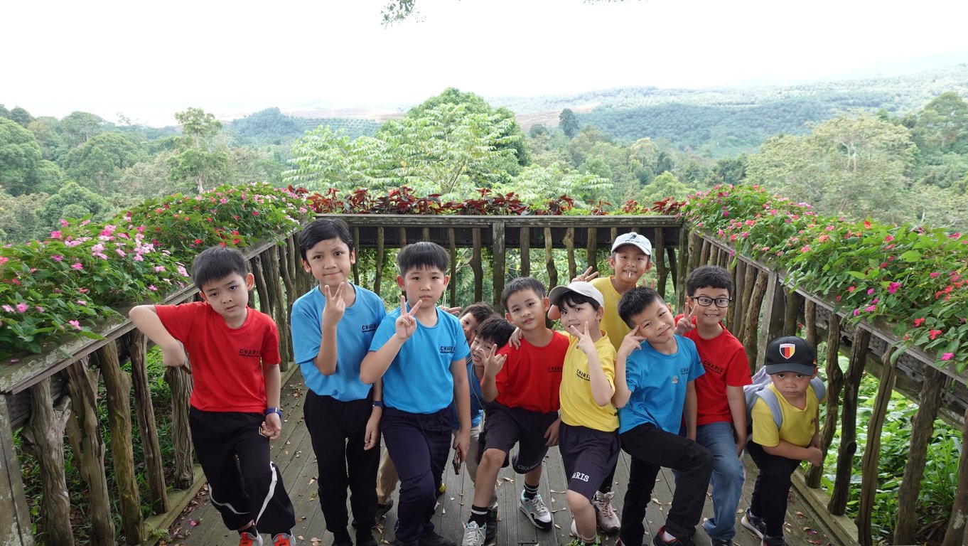 Students pause for a photo during a field trip to the highlands, part of the Outdoor Education programme.