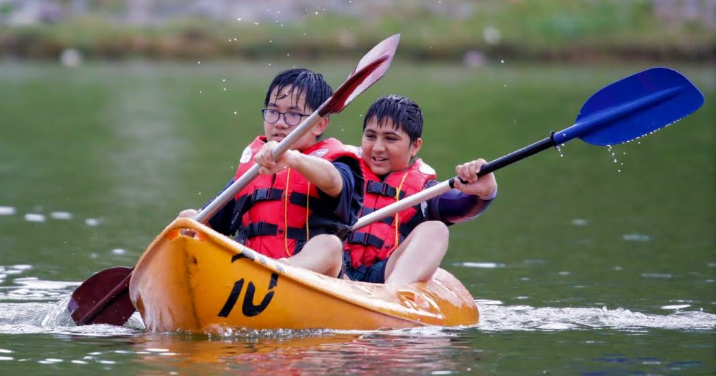 Cubs and Scouts kayaking during their trip to Putrajaya lake.