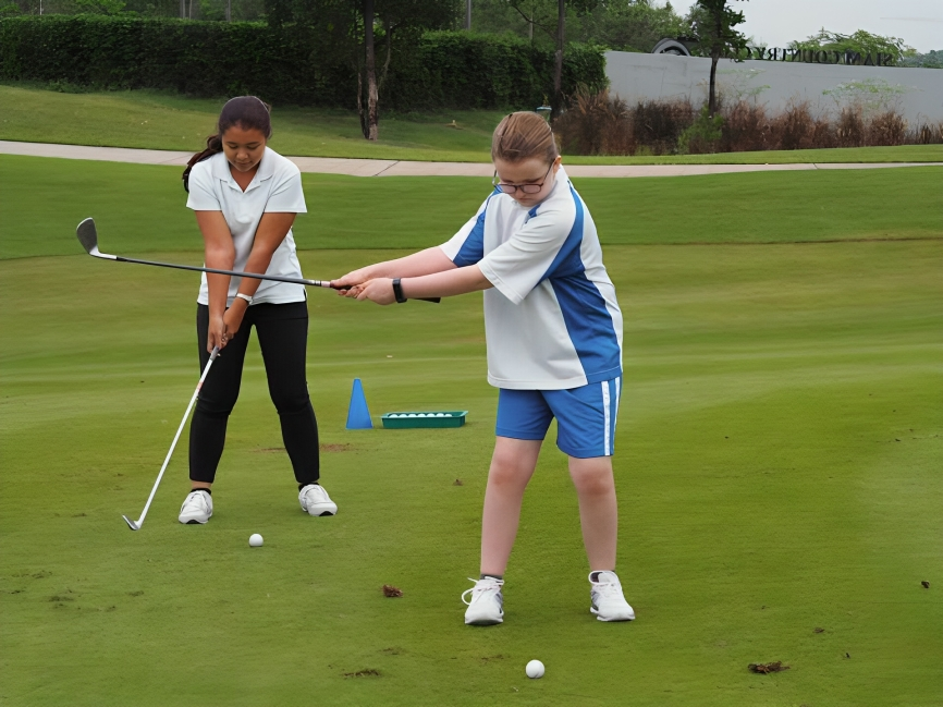 Students during a golf practice session.