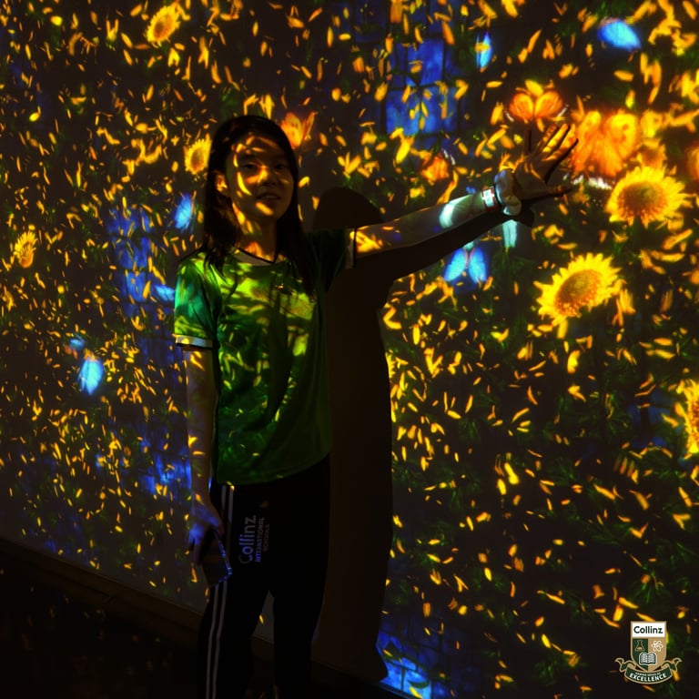 Secondary student experiencing immersive digital art environment.