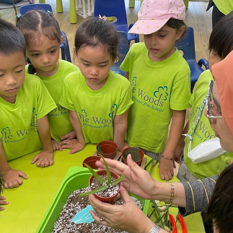 Students taking in a demonstration on their field trip to the Jacob Ballas Children’s Garden.