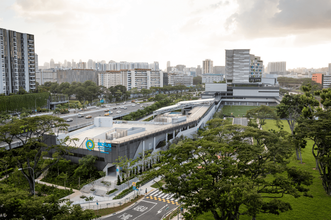 The school campus viewed from above, with the PIE visible in the background.