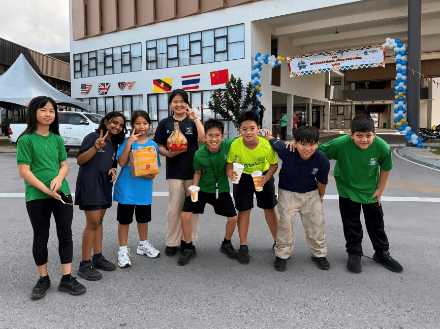 Students enjoy global snacks and fun during the BIS International Food Festival celebration.