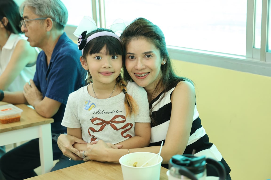 Parents and students celebrate together at our joyful year-end program.