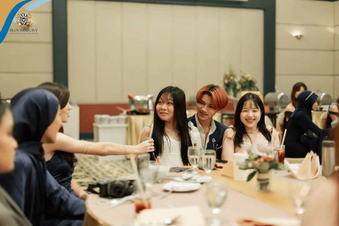 Students enjoying conversations during Prom Night celebrations.