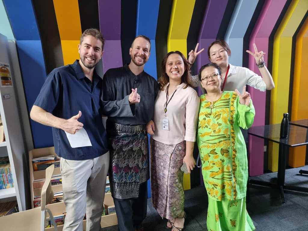 Parents joining in the festivities dressing up in Raya attires for KGIS Hari Raya celebration.