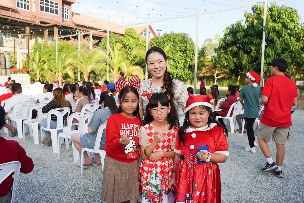 Students posing at the Christmas event.