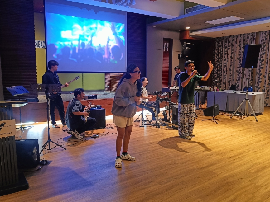 Students rehearse a band set during after-school music club.