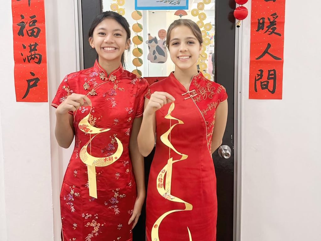 Students showcase the decorations they made for the Chinese New Year celebrations on campus.