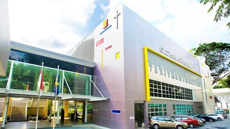 A front view of the main building at the entrance of the school