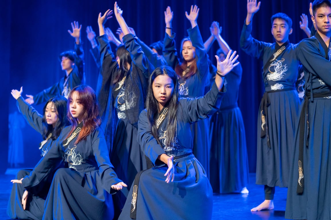Students performing an artistic dance at the CultuRama Festival, hosted on the Dover Campus