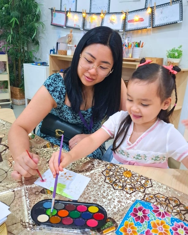 Parents join in the classroom for 'Stay and Play', a component of the Early Years curriculum.