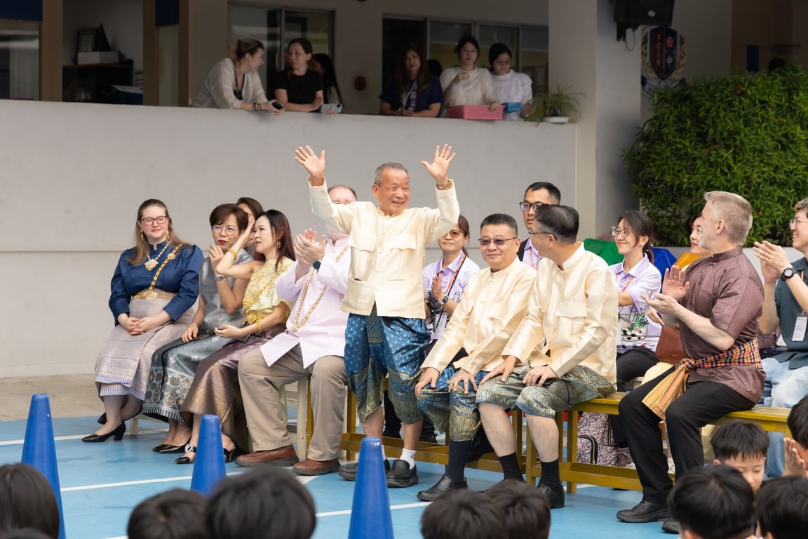 The school community celebrating Loy Krathong in traditional attire.