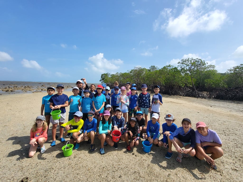 The CM2 students on the beach during a class trip to Bintan