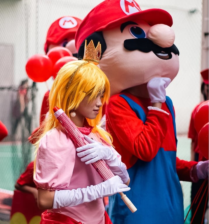 Students dressed as Mario and Princess Peach for school celebration.