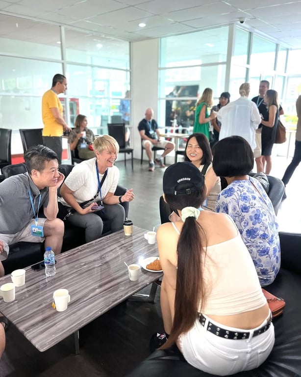 Families chatting over coffee during a morning get-together.