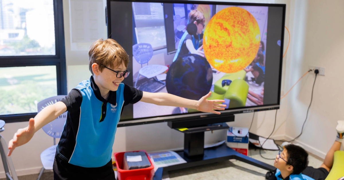 Learners use technology in a purposeful way to enhance their learning. This learner is using augmented reality to examine the solar system.